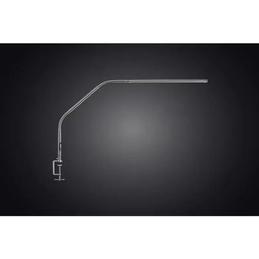 Daylight D35109 Slimline 4 Table Lamp on a minimalist desk
Slimline 4 lamp lighting a detailed artwork in progress
Side profile of Daylight Slimline 4 lamp with clamp base