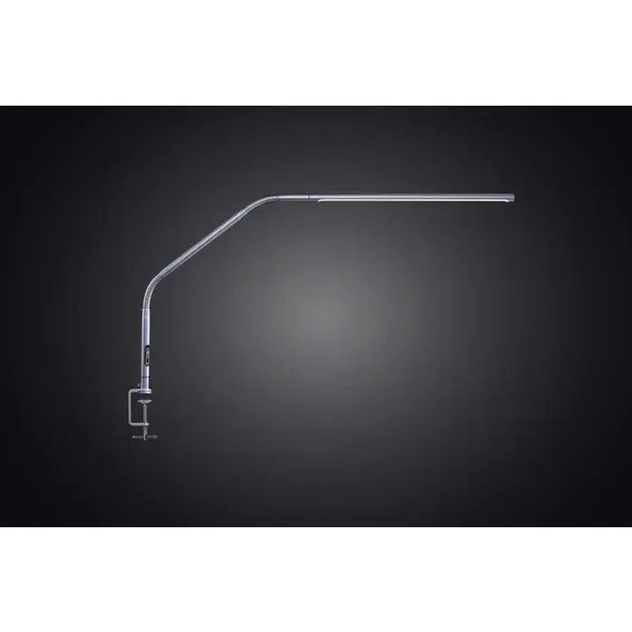 Daylight D35109 Slimline 4 Table Lamp on a minimalist desk
Slimline 4 lamp lighting a detailed artwork in progress
Side profile of Daylight Slimline 4 lamp with clamp base