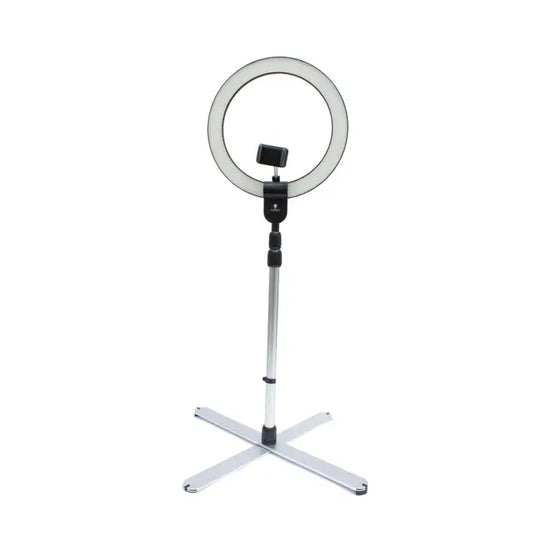 Daylight D35450 Aura Ring Lamp set up on a makeup table
Aura Ring Lamp illuminating a vlogger's recording setup
Adjustable Daylight D35450 Ring Light with tripod stand