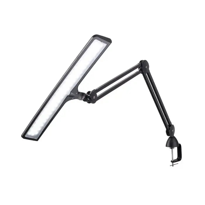 Side view of Daylight UnoPro lamp with ergonomic design
Daylight DN1450 UnoPro lamp in a modern home office setup
LED light head of UnoPro Table Lamp angled for close-up tasks