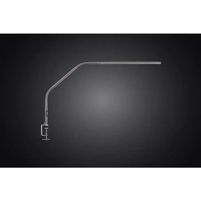 Daylight D35109 Slimline 4 Table Lamp on a minimalist desk

Slimline 4 lamp lighting a detailed artwork in progress

Side profile of Daylight Slimline 4 lamp with clamp base