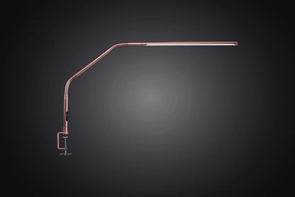 Daylight D35109 Slimline 4 Table Lamp on a minimalist desk

Slimline 4 lamp lighting a detailed artwork in progress

Side profile of Daylight Slimline 4 lamp with clamp base