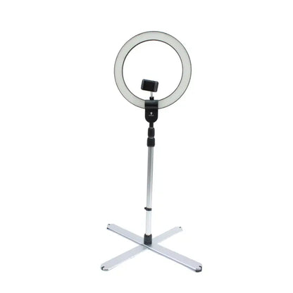 Daylight D35450 Aura Ring Lamp set up on a makeup table

Aura Ring Lamp illuminating a vlogger's recording setup

Adjustable Daylight D35450 Ring Light with tripod stand