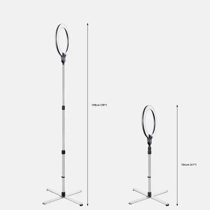 Daylight D35450 Aura Ring Lamp set up on a makeup table

Aura Ring Lamp illuminating a vlogger's recording setup

Adjustable Daylight D35450 Ring Light with tripod stand