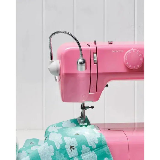 DN1180 sewing machine LED lamp with flexible arm

Magnetic daylight lamp attached to sewing machine

Compact LED light for embroidery and quilting

