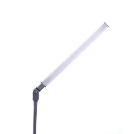 Side view of Daylight UnoPro lamp with ergonomic design

Daylight DN1450 UnoPro lamp in a modern home office setup

LED light head of UnoPro Table Lamp angled for close-up tasks

