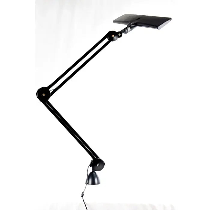 Side view of Daylight UnoPro lamp with ergonomic design

Daylight DN1450 UnoPro lamp in a modern home office setup

LED light head of UnoPro Table Lamp angled for close-up tasks

